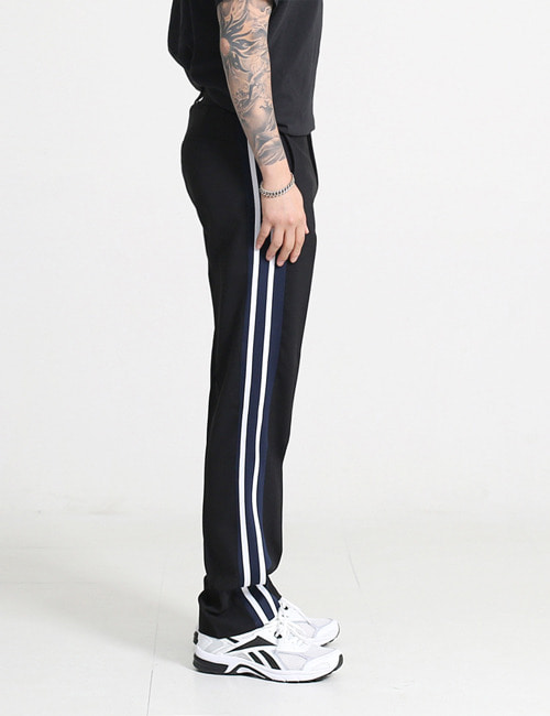 V. TAILORED TRACK TROUSERS